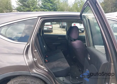 2014 Honda Cr-V Lx z USA, uszkodzony, nr VIN 2HKRM4H31EH672497